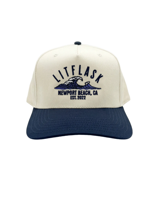 Beige and navy cap with 'LITFLASK' branding on a white background