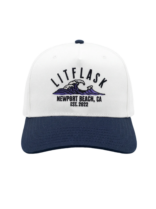White and navy cap with 'LITFLASK' branding on a white background